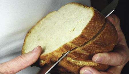 Brot schneiden - cut bread Butterbrot - bread and butter [ (c) www.BilderBox.com, Erwin Wodicka, Siedlerzeile 3, A-4062 Thening, Tel. + 43 676 5103678.Verwendung nur gegen HONORAR, BELEG,URHEBERVERMERK und den AGBs auf bilderbox.com](in an im auf aus
