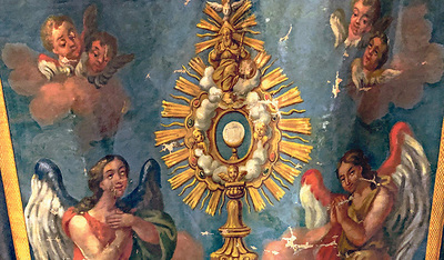 Die Monstranz mit der Hostie steht für die Zunft der Müller.  