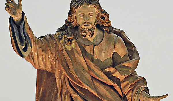 Der wiederkehrende Christus, wie er in der Kirche St. Moritz in Augsburg den Menschen entgegengeht – geschaffen von Georg Petel während des Dreißigjährigen Krieges.  