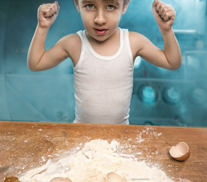 Little chefs enjoying in the kitchen making big mess