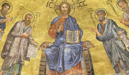 Im 800 Jahre alten Mosaik der Basilika St. Paul vor den Mauern in Rom blickt Jesus ernst, aber freundlich.  