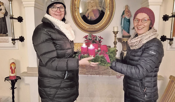 Die Feiern um den Adventkranz verbinden katholische und evangelische Familien. 