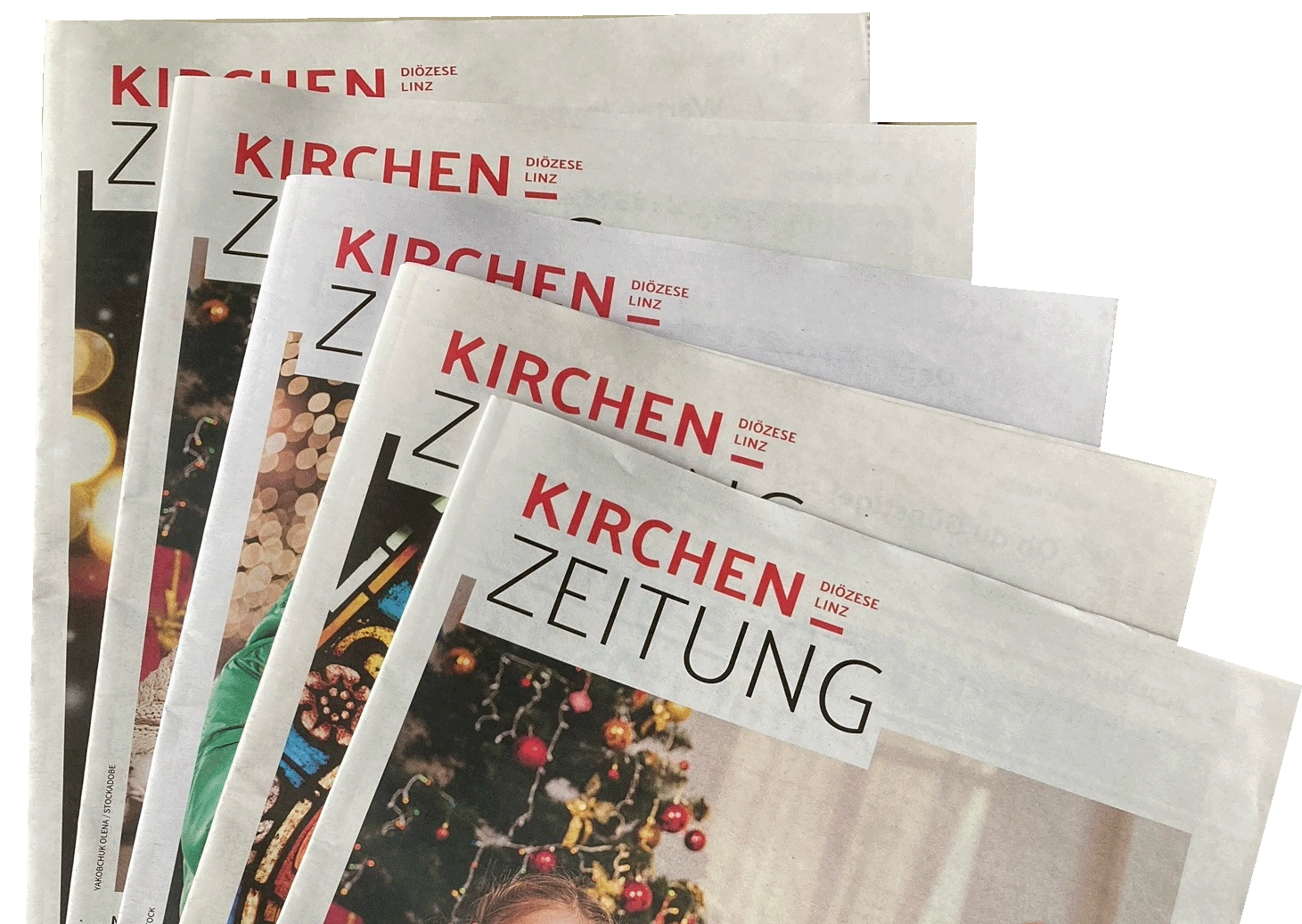 5 Kirchenzeitungen die aufgefächert abgebildet sind.