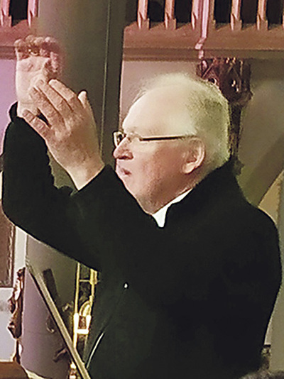 Ernst Kronlachner bei einer Chorprobe 